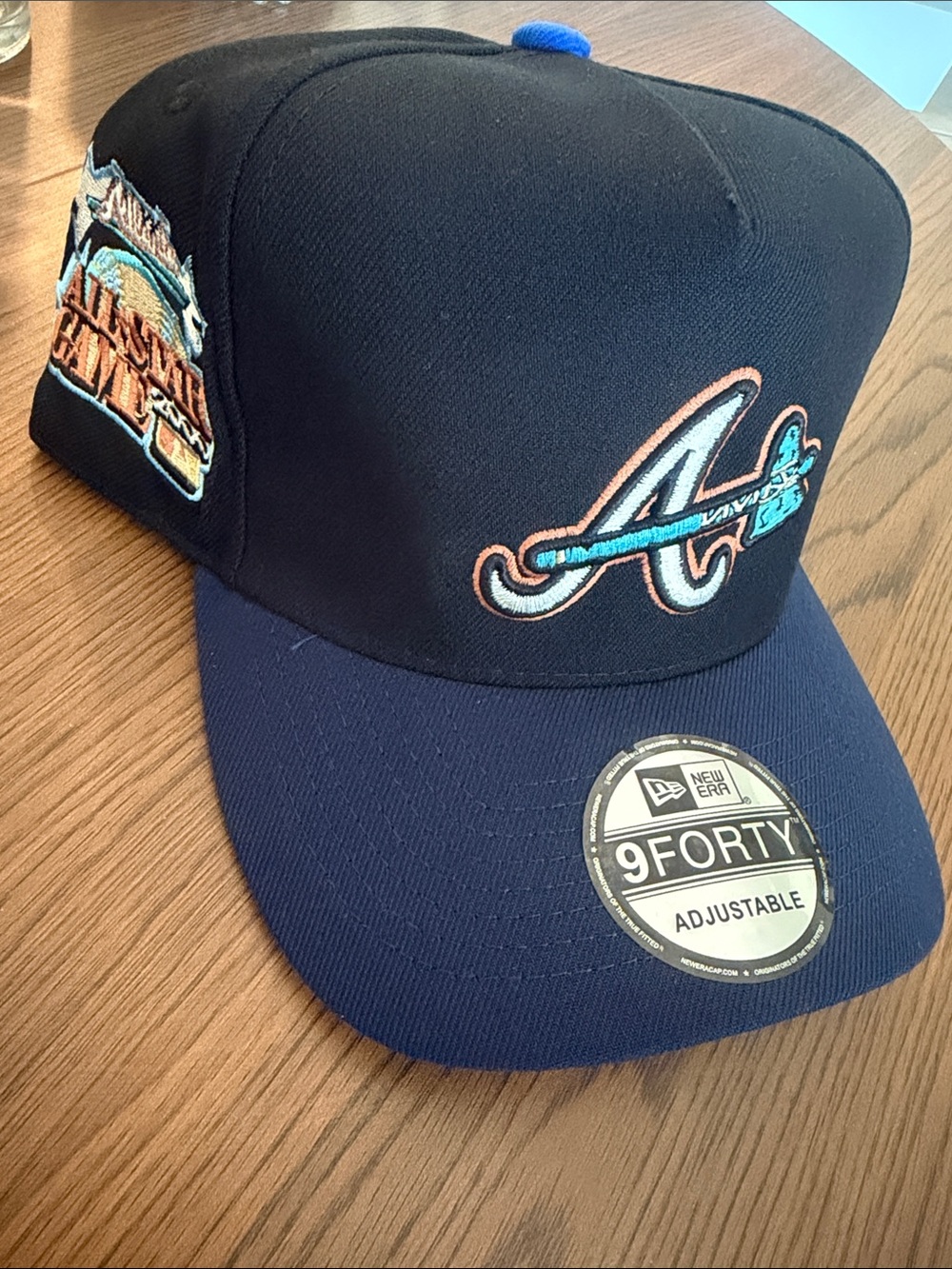 New Era Navy and Black Baseball Cap with Embroidered Logo